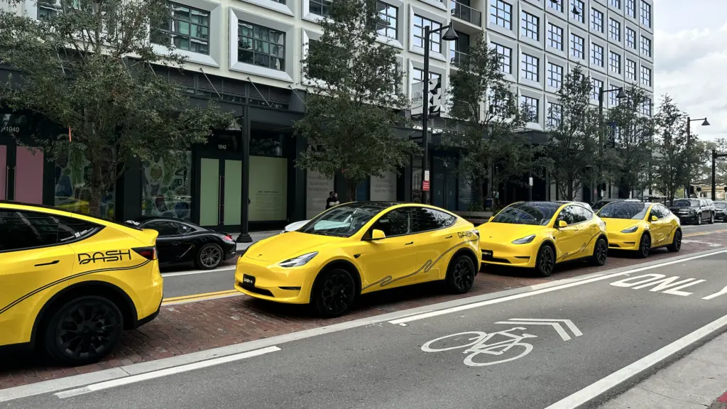a row of yellow cars