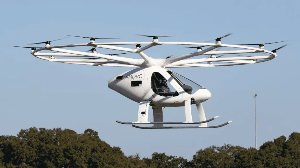 an electric helecopter takes off