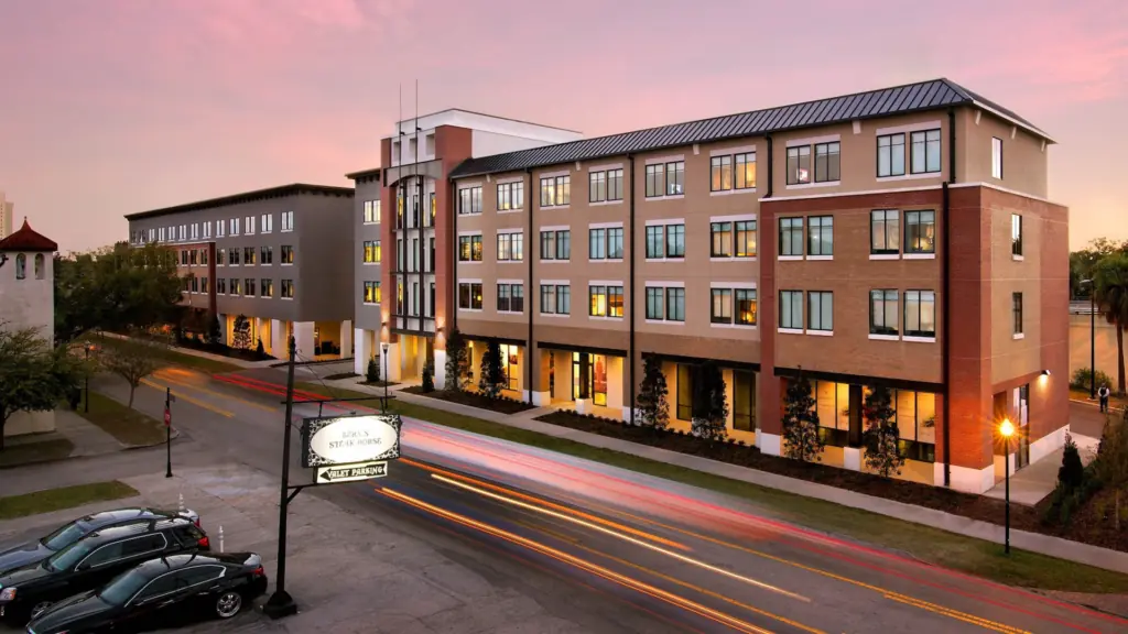 Exterior of a hotel at sunset