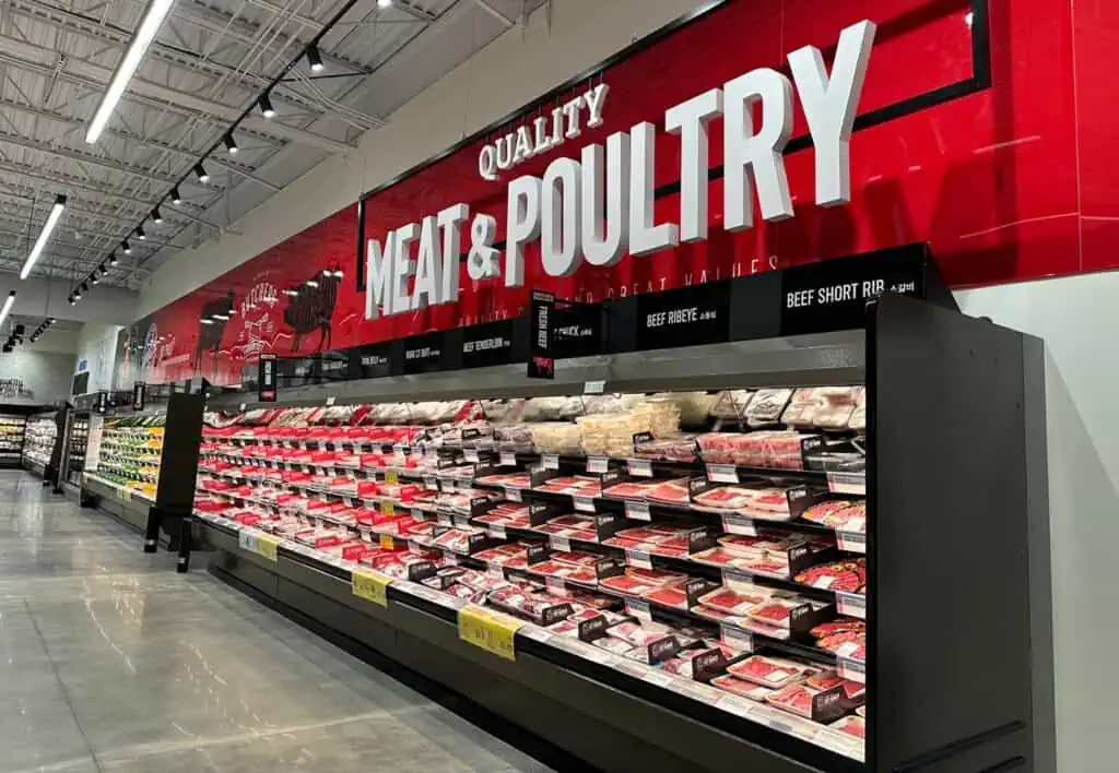 meat and pultry on display inside a grocery store