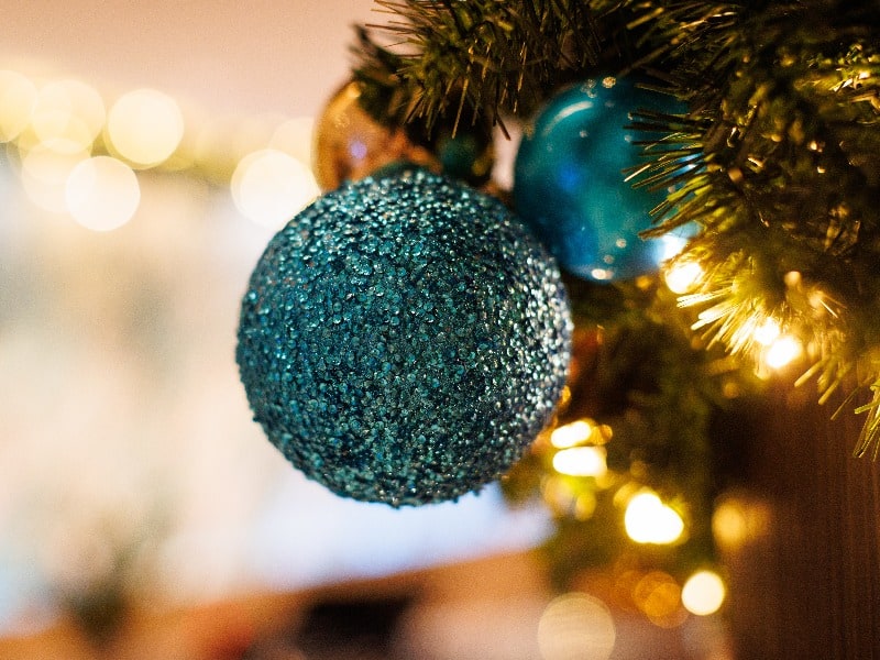 Blue Sparkly Ornament on Christmas Tree