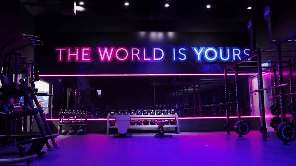 a gym classroom with purple lights