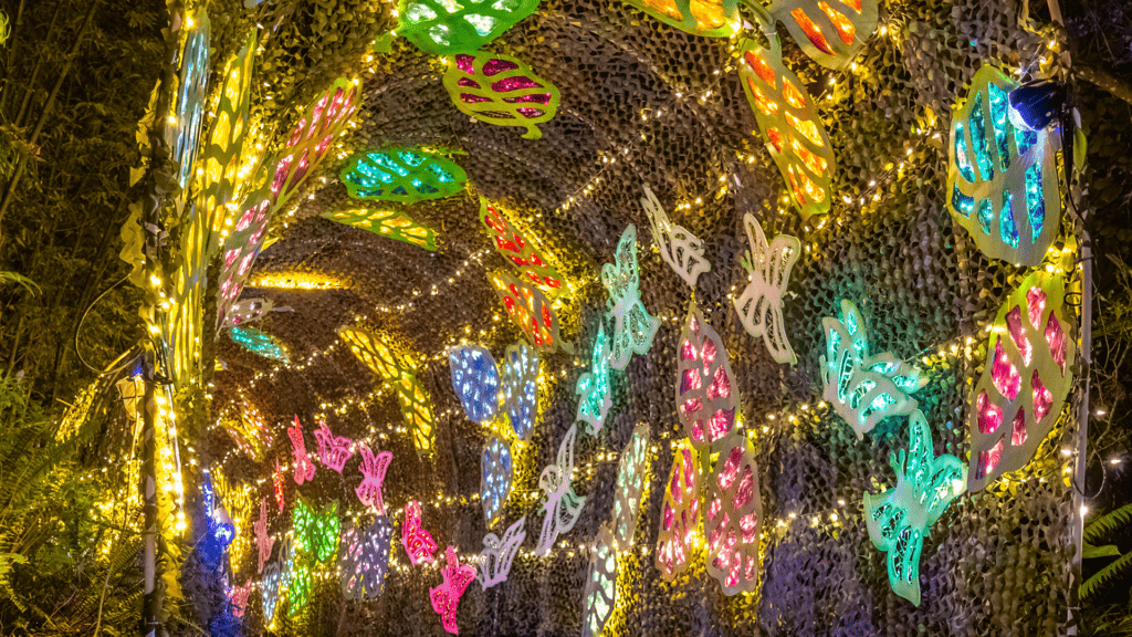 a huge tunnel filled with illuminated butterflies