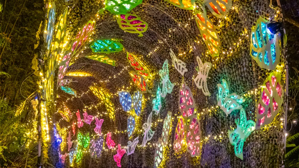 a huge tunnel filled with illuminated butterflies