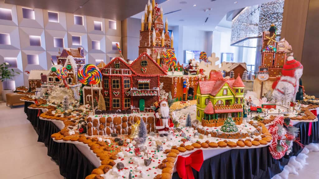 a large gingerbread house I the lobby of a hotel