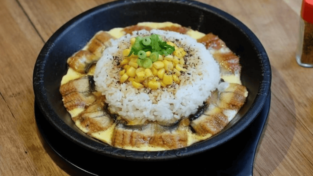bowl of rice with egg and protein