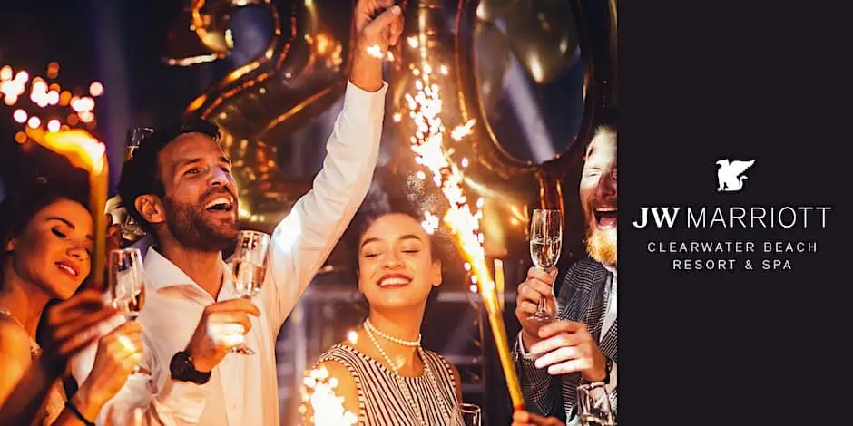 People celebrating New Year's Eve with sparklets and champagne