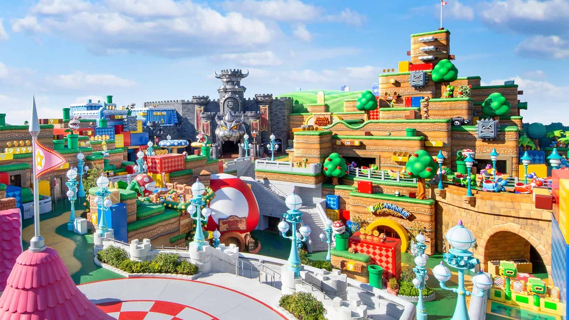 rendering of a large theme park with castle and bright blocks displayed