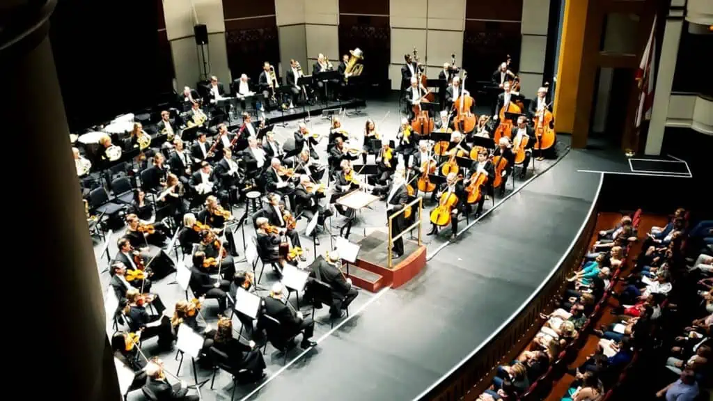 an orchestra live on stage