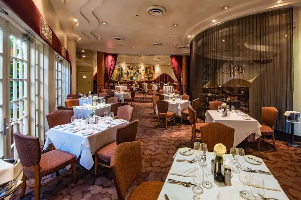 interior of a restaurant with a private dining area behind a curtain