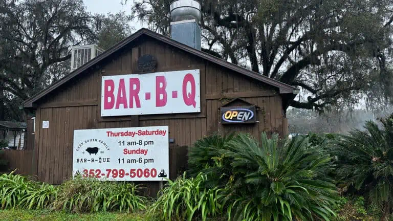 exterior of a small wood bbq shack