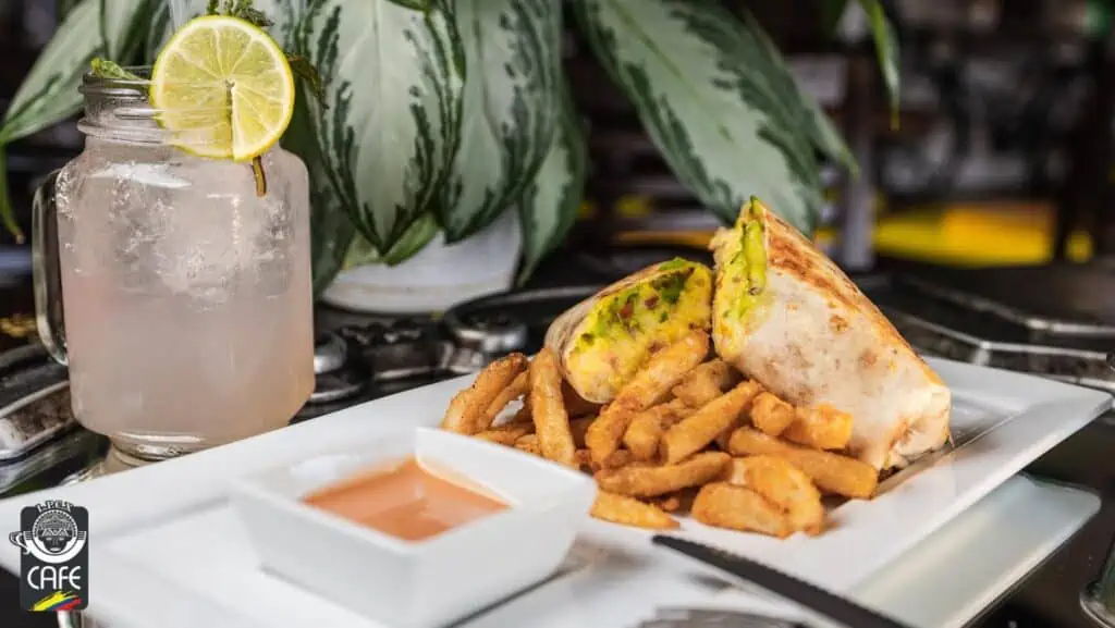 LPCX Cafe's breakfast wrap with crispy fries and a refreshing juice is the perfect way to kick off your day.