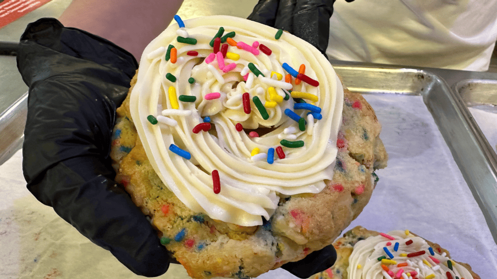a cookie covered in sprinkles and frosting