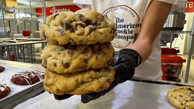 a huge stack of chocolate chip cookies