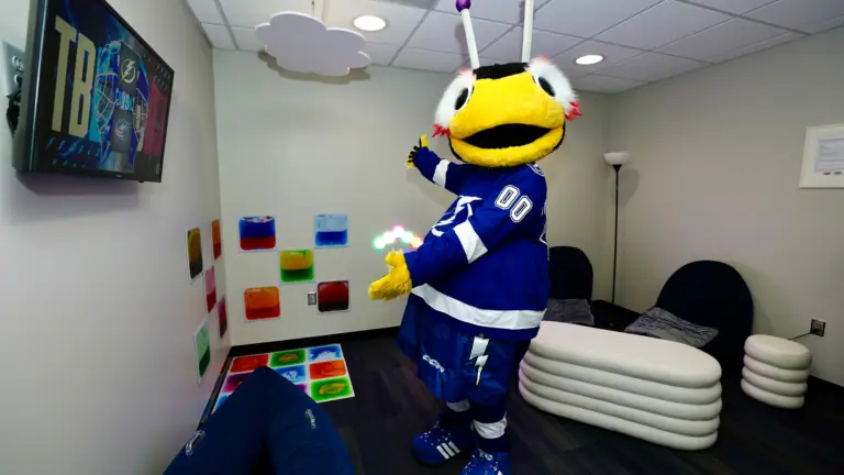 a mascot in a sensory room at a hockey arena