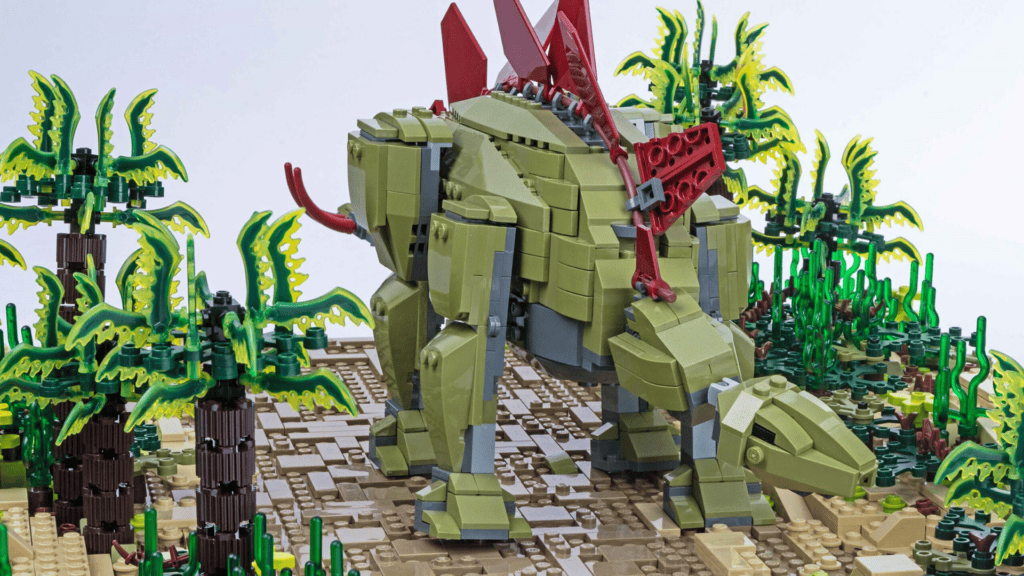 a dinosaur made up of green lego bricks