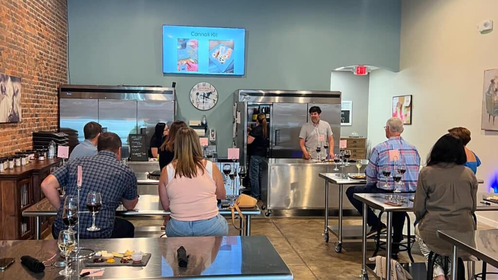 a group of people participate in a cooking class