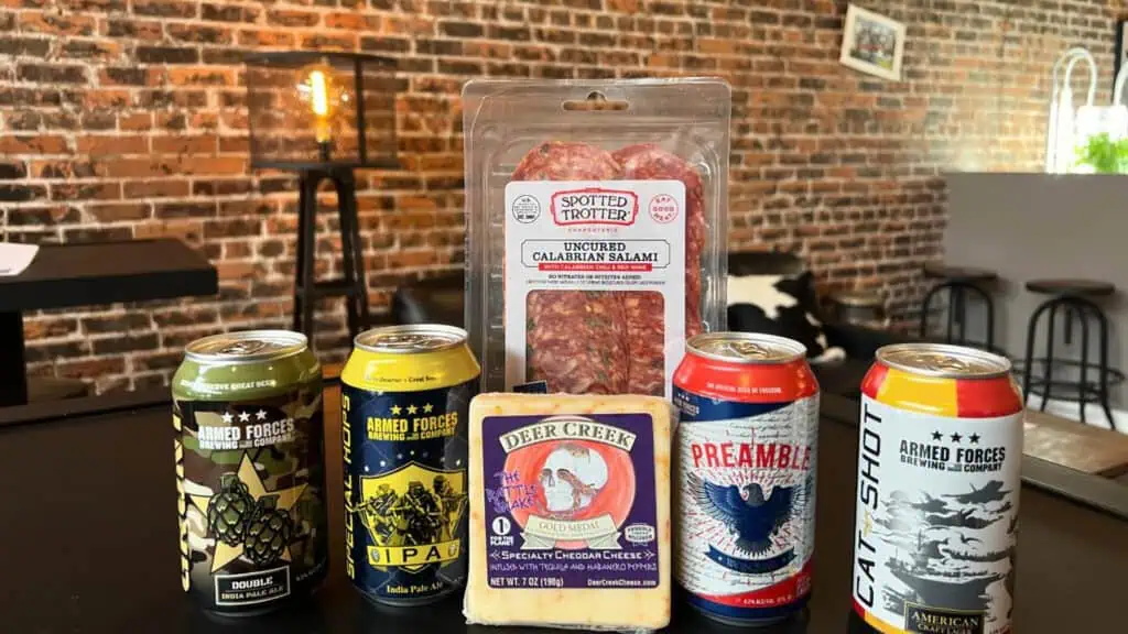 a selection of beers and wines paired with meat