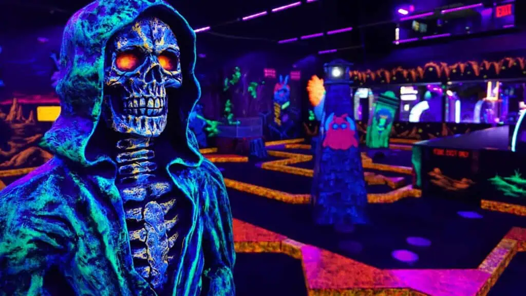 interior of a glow in the dark mini golf course