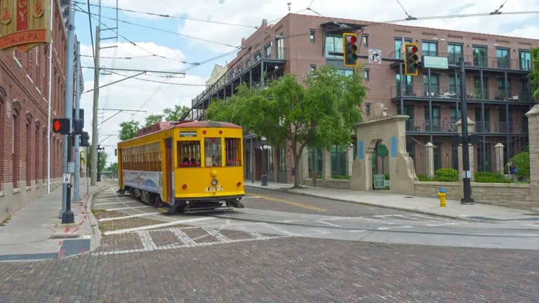 Streetcar on a brick path in a downtown area