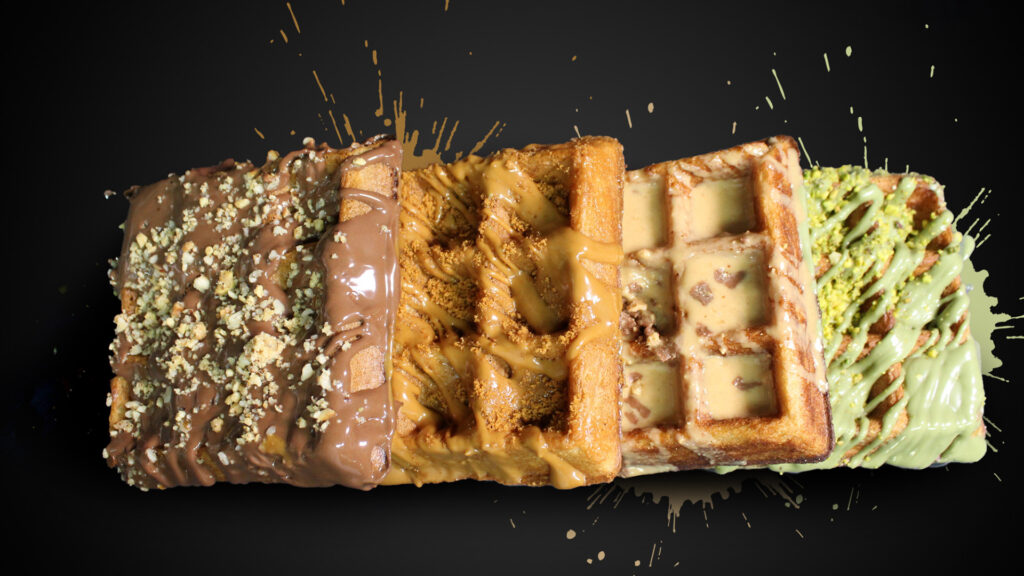 aerial view of a plate of waffles covered in different candies