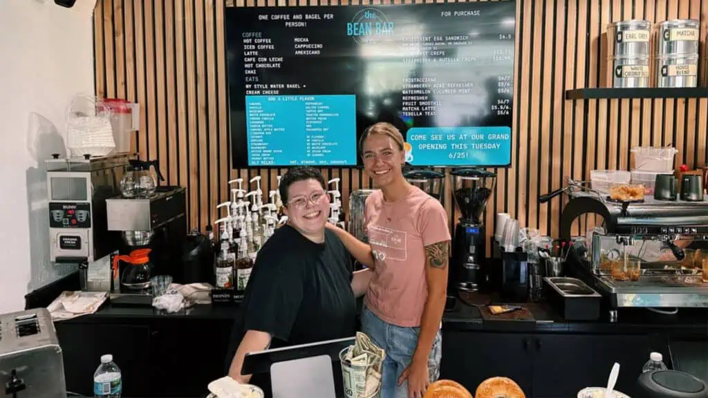 two baristas behind the counter at Bean Bar 