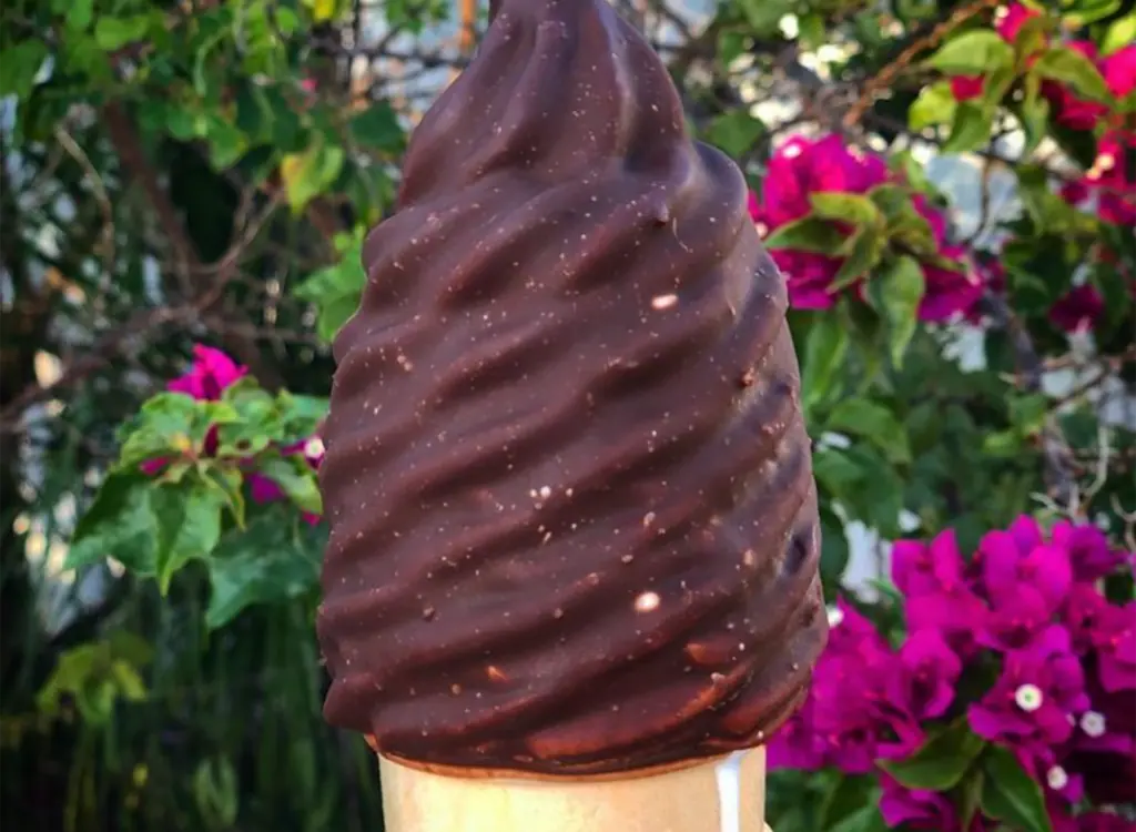 a chocolate dipped ice cream cone