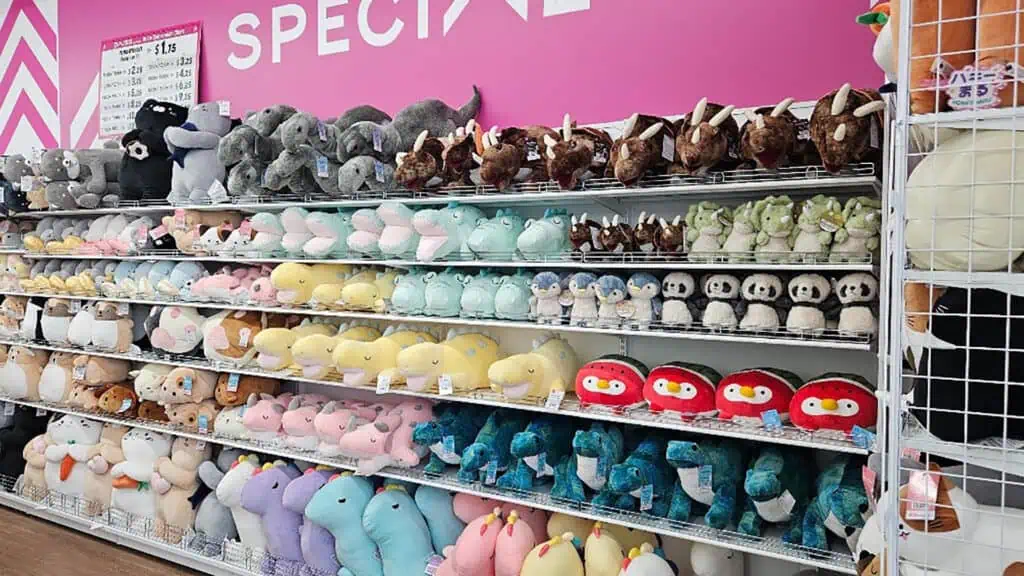 plush figures arranged on shelves 