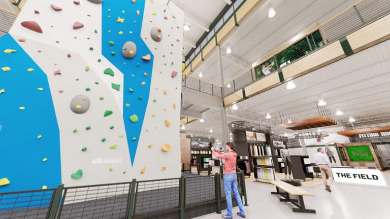 rendering of a rock climbing wall at the center of a store