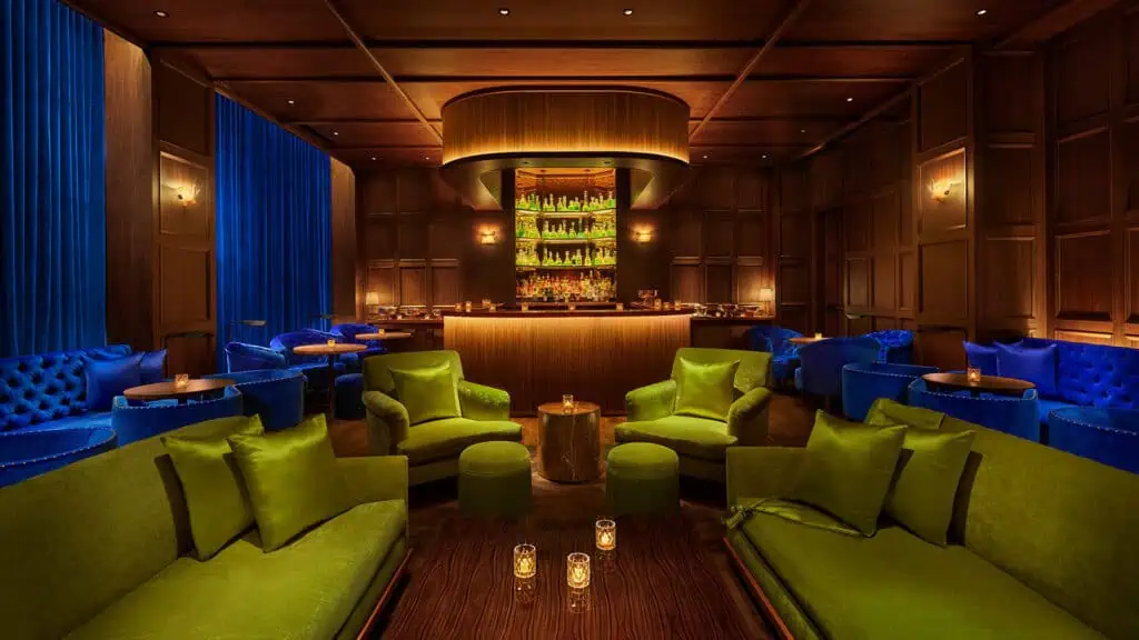 rendering of a cocktail bar with velvet curtains