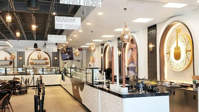 interior of an ice cream shop with multiple scoop stations