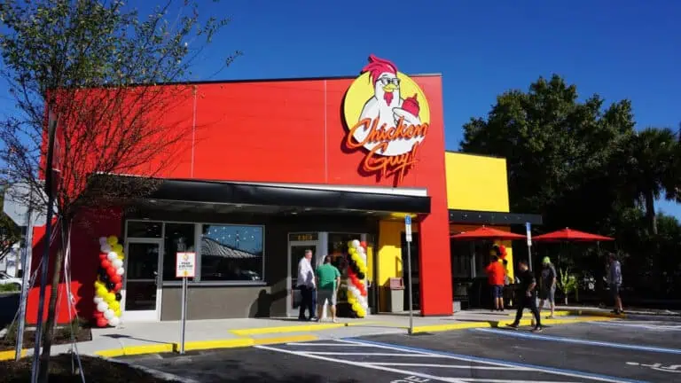 exterior of a chicken restaurant with a red and yellow paint job