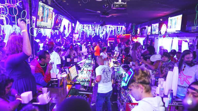 interior of a bar with UV glow lights everywhere