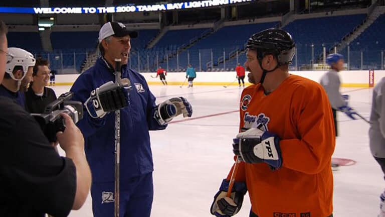 hockey players on the ic running drills