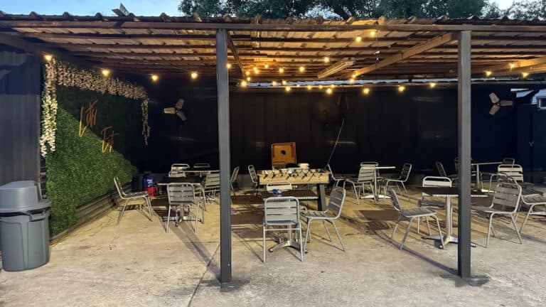 outdoor seating area of a food truck park