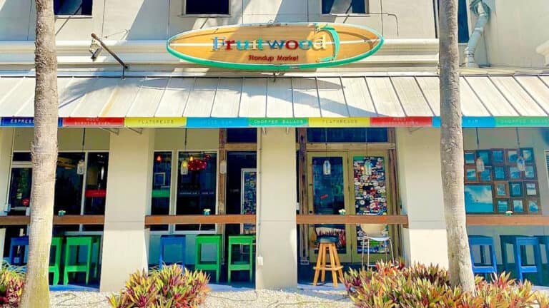 exterior of a restaurant with a paddle board over the front entrance