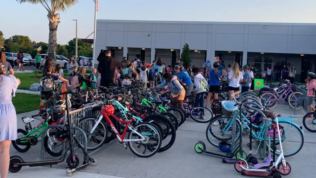 a group of cyclists meet for a group ride