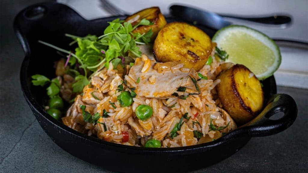 a rice and plantain dish with vegetables 