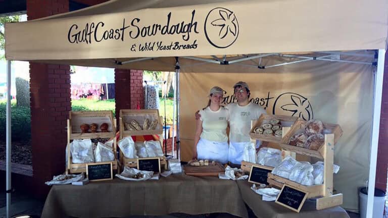 a vendor booth at a farmers market