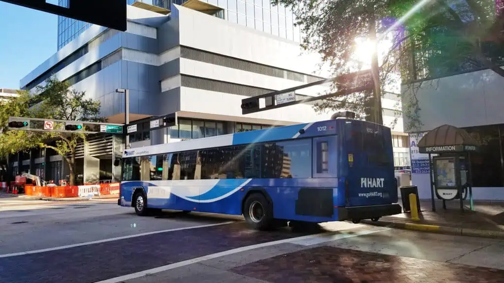 Bus with buildings in background