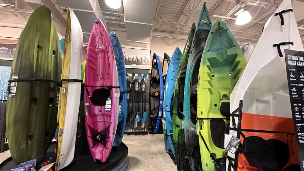 row of kayaks on display 