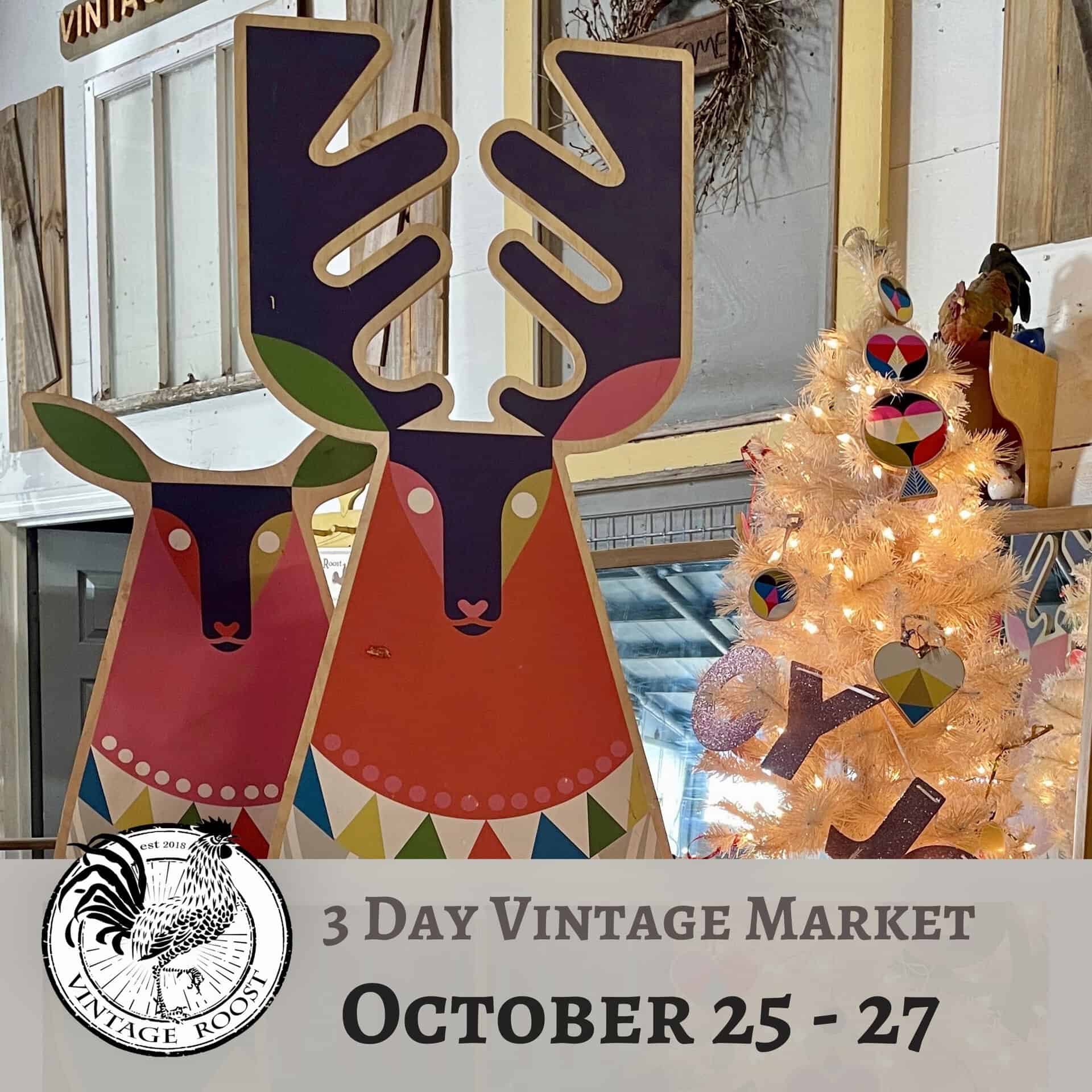 Colorful reindeer decorations and a white Christmas tree with ornaments are displayed at a 3 Day Vintage Market event happening from October 25 to 27.