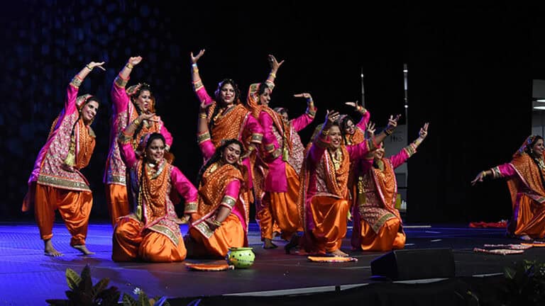 performers dance on stage