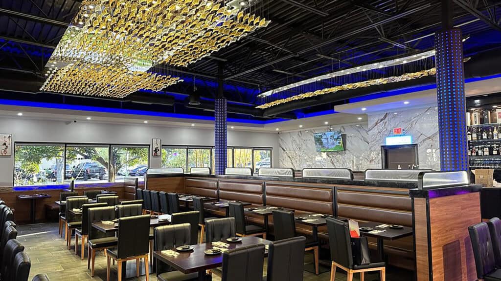 interior of a restaurant with multiple tables set up