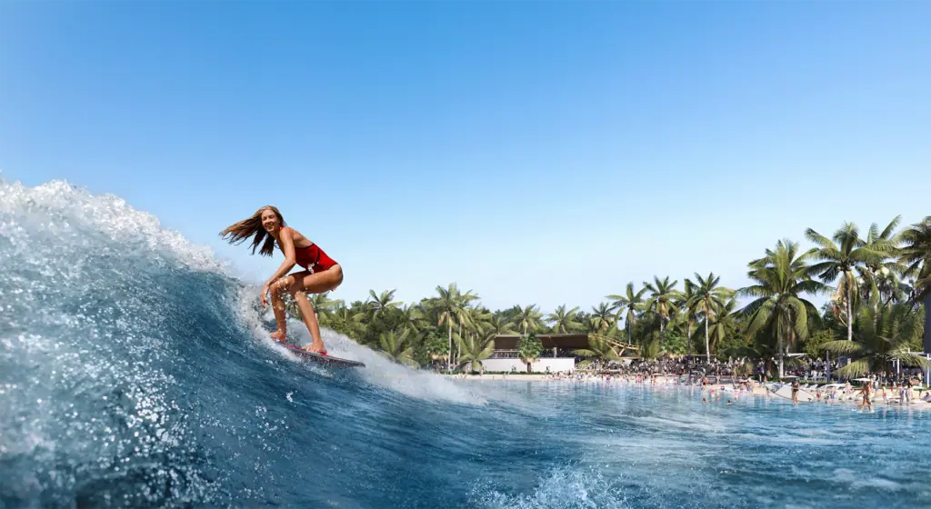 a person surfing on the waves at a park 