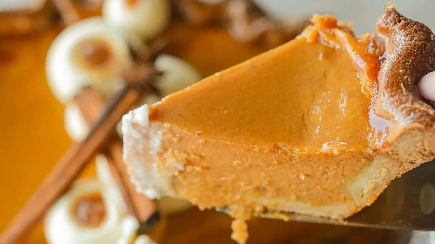 Slice of silky pumpkin pie from Sucre Table