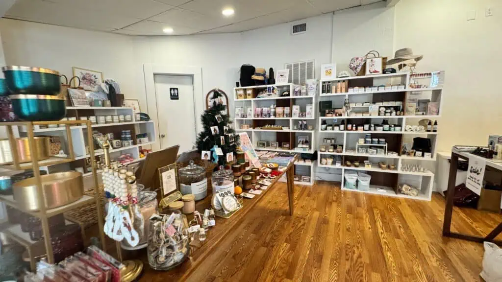 inside Procure tampa, tables and shelves of gift items inside a well lit space