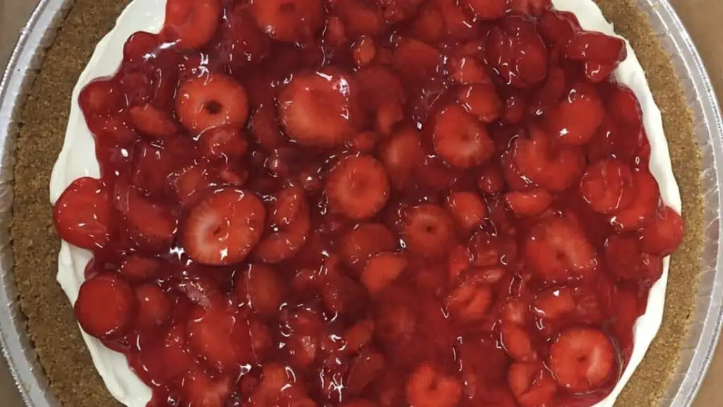 aerial view of a strawberry pizza on a graham cracker crust 