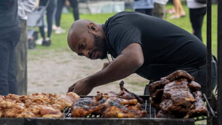 A pitmaster smoking meats