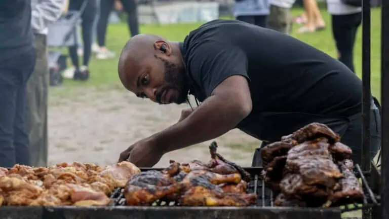 A pitmaster smoking meats